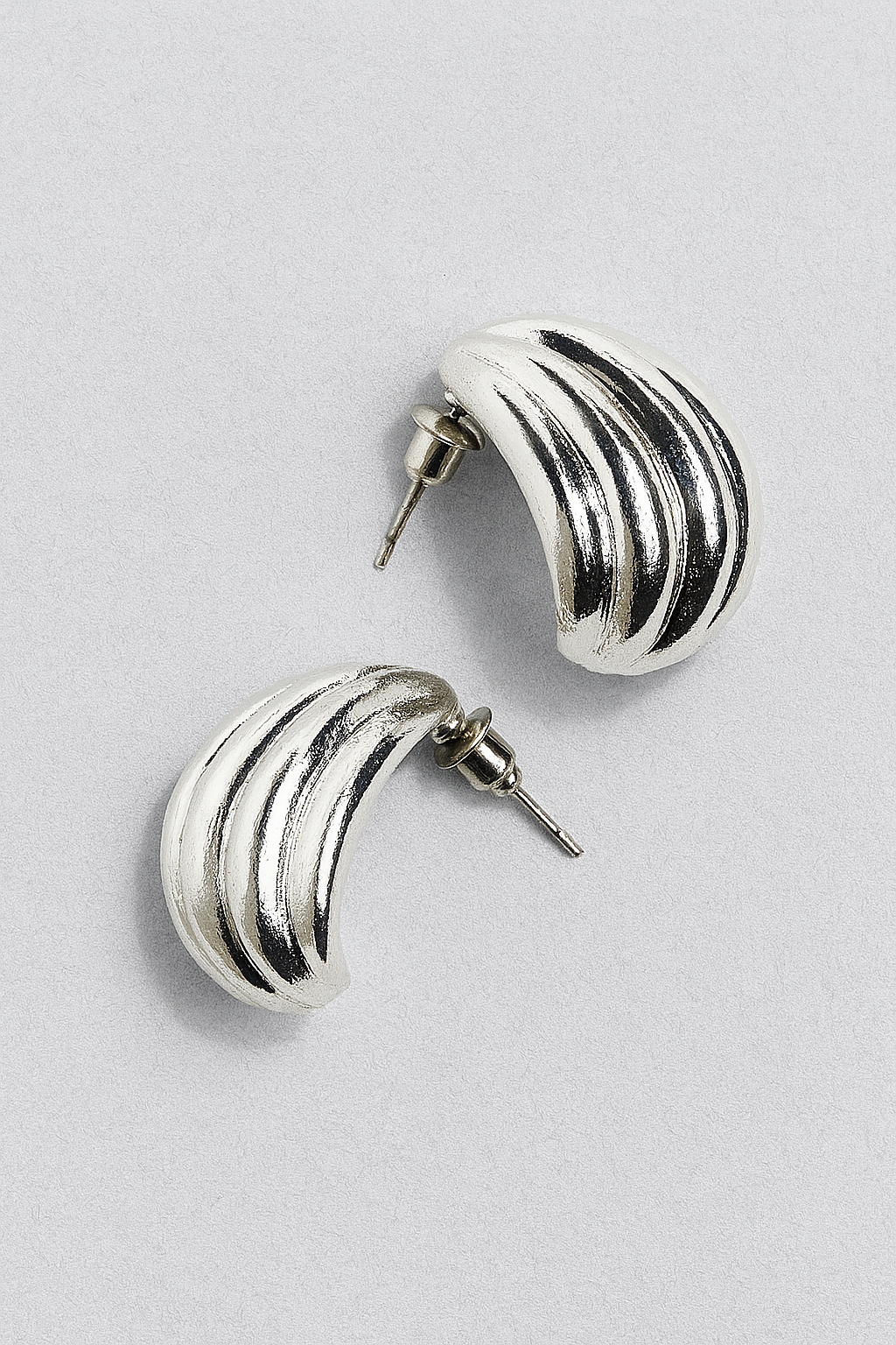 Bold Curve Silver Stud Earrings